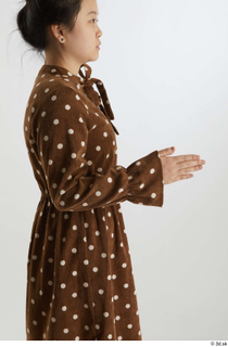 Aera  1 arm brown dots dress casual dressed flexing…